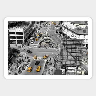 Black and white photograph of a busy Manhattan intersection in the Meatpacking District, with highlighted yellow cabs Sticker